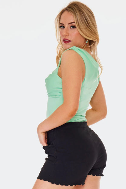 Retro High waisted black shorts with embroidered scallop pocket detail